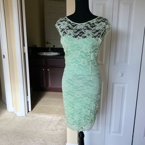 Donna Mizani green lace dress